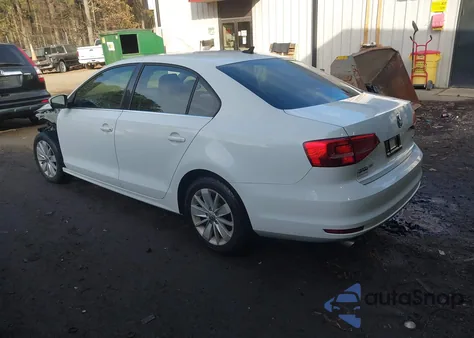 2015 Volkswagen Jetta 1.8T Se z USA, uszkodzony, nr VIN 3VWD07AJ1FM296747
